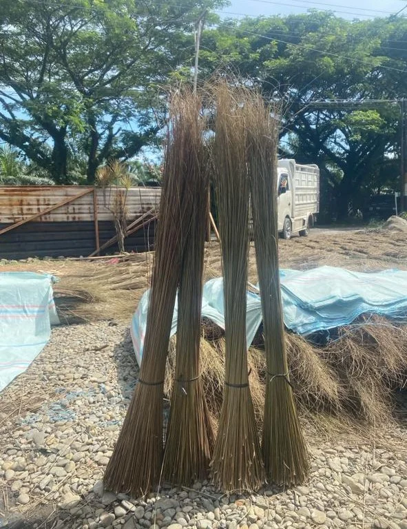 Bundles of palm broom sticks (lidi sawit) supplied by CV Jaya Berkah Java